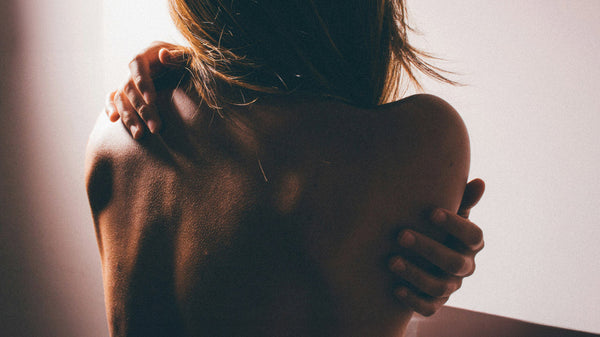 Woman's Back And Shoulders In Shadow