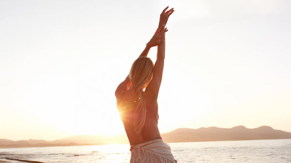 Woman's Silhouette In Front Of Beach Sun Set