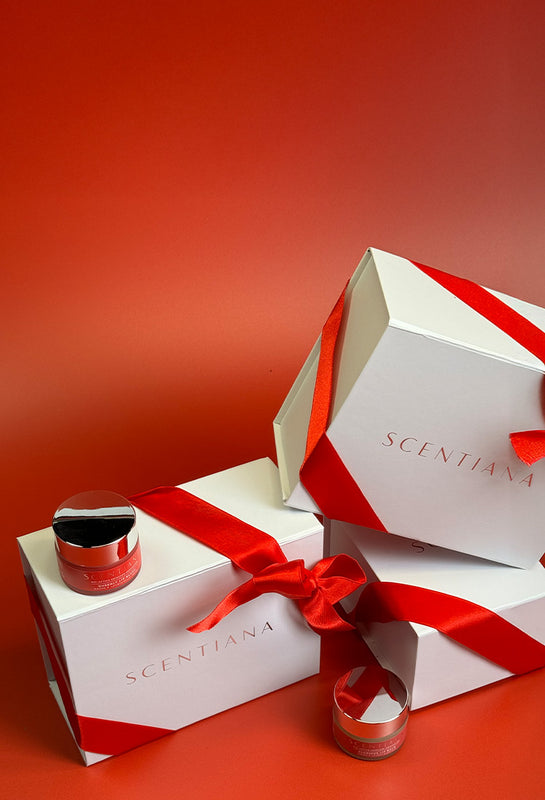 Lip Products With Red Ribbons Around Gift Boxes