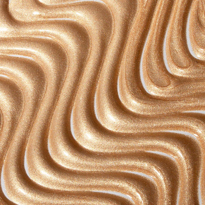 Close-up of wavy, gold-coloured product texture